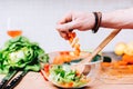 salad making of details. Professional cook master chef preparing special salad with carrots and vegetables