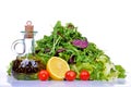 Salad mix with rucola, frisee, radicchio, lettuce and bottle of olive oil, lemon Royalty Free Stock Photo