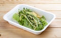 Salad mix of spaghetti with zucchini. Healthy food. Takeaway food. On a wooden background