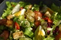 Salad in the morning. Salad with egg, lettuce, tomato, croutons, pepper. Diet, proper nutrition Royalty Free Stock Photo