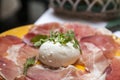 Salad with parma ham, mozzarella and rucola on plate Royalty Free Stock Photo