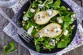 Salad with pears, arugula, blue cheese and pine nuts Royalty Free Stock Photo
