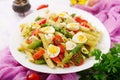 Salad - penne pasta with asparagus, tomatoes, quail eggs Royalty Free Stock Photo