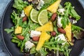 salad with pineapple, blue cheese and almond. Food recipe background. Close up