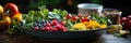 Salad plate with different vegetables and fruits in back bowl