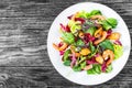 Salad with prawns, mussels, lettuce leaves, spinach, arugula, radicchio rosso.