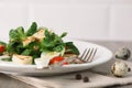 Salad with quail egg, cherry tomato, crackers and corn salad on wooden background Royalty Free Stock Photo