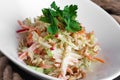 Salad with radish, carrot, tomato and walnut