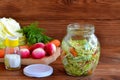 Salad of radish, carrots, cabbage, olive oil, salt and dill. Royalty Free Stock Photo