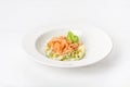 Salad with red fish, peas, fresh herbs in a white plate Royalty Free Stock Photo