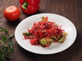 Salad of red and white cabbage and sweet red pepper, seasoned with olive oil Royalty Free Stock Photo