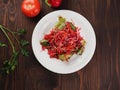 Salad of red and white cabbage and sweet red pepper, seasoned with olive oil Royalty Free Stock Photo