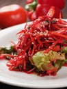 Salad of red and white cabbage and sweet red pepper, seasoned with olive oil Royalty Free Stock Photo