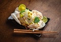 Salad of rice noodles, chicken, vegetables and rice chips. Asian cuisine Royalty Free Stock Photo