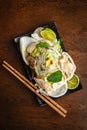 Salad of rice noodles, chicken, vegetables and rice chips. Asian cuisine Royalty Free Stock Photo