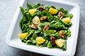 Salad with Rocket Leaves, Orange and Walnuts / Arugula or Rucola. Royalty Free Stock Photo