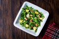 Salad with Rocket Leaves, Orange and Walnuts / Arugula or Rucola. Royalty Free Stock Photo