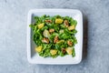 Salad with Rocket Leaves, Orange and Walnuts / Arugula or Rucola. Royalty Free Stock Photo