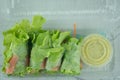 Salad roll vegetables wrapped in flour on clear plastic box Royalty Free Stock Photo