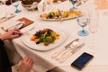 Salad with seafood, octopus, strawberry, citrus and greens