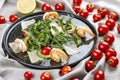 Salad with shrimp, cherry tomatoes, avocado and arugula on textile background Royalty Free Stock Photo