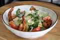 Caesar salad with shrimp. Caesar salad on a white background