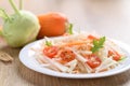 Salad with sliced kohlrabi, carrot, tomato and mizuna leaf