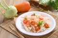 Salad with sliced kohlrabi, carrot, tomato and mizuna leaf
