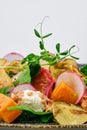 Salad with soft cheese, radish, pear, pumpkin and sun dried tomato Royalty Free Stock Photo