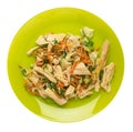 Salad with soy asparagus and carrots, cucumbers and dumplings on a plate. vegetarian soy salad on a plate isolated on white