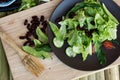 Salad with spinach, red beans, tomato and pea pods