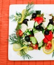 Salad on square plate