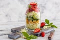 Salad with strawberries and chickpeas in a jar. Royalty Free Stock Photo