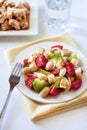 Salad with three kinds of tomatoes, boiled white kidney beans an Royalty Free Stock Photo