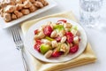 Salad with three kinds of tomatoes, boiled white kidney beans an Royalty Free Stock Photo