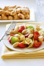 Salad with tomatoes, boiled white kidney beans and croutons Royalty Free Stock Photo