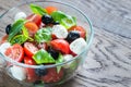 Salad with tomatoes, olives, mozzarella and basil Royalty Free Stock Photo