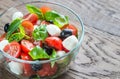 Salad with tomatoes, olives, mozzarella and basil Royalty Free Stock Photo