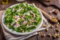 Salad with tomatoes and roasted nuts Royalty Free Stock Photo