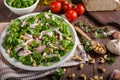 Salad with tomatoes and roasted nuts Royalty Free Stock Photo