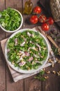 Salad with tomatoes and roasted nuts Royalty Free Stock Photo