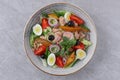 salad with tuna, quail eggs and baked potatoes on a stone background, studio food photography 2 Royalty Free Stock Photo