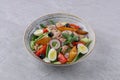 salad with tuna, quail eggs and baked potatoes on a stone background, studio food photography 4 Royalty Free Stock Photo