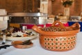 Salad and typical clay pot for buffet of traditional mexican food in Mexico