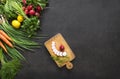 Salad vegetable concept with cutting board on rustic background, organic fresh and raw green vegetables Royalty Free Stock Photo