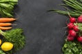 Salad vegetable concept with cutting board on rustic background, organic fresh and raw green vegetables Royalty Free Stock Photo