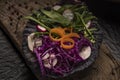 Salad with vegetables on a cabbage leaf