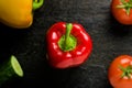 Salad vegetables: tomatoes, fresh pepper and cucumber. Concept for a tasty and healthy meal.Vitamins in vegetables and herbs for i Royalty Free Stock Photo