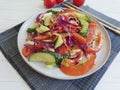 Salad, vegetarian chinese food tomato fresh nutrition health on a wooden background table Royalty Free Stock Photo