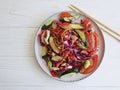 Salad, vegetarian chinese food on a wooden background table Royalty Free Stock Photo